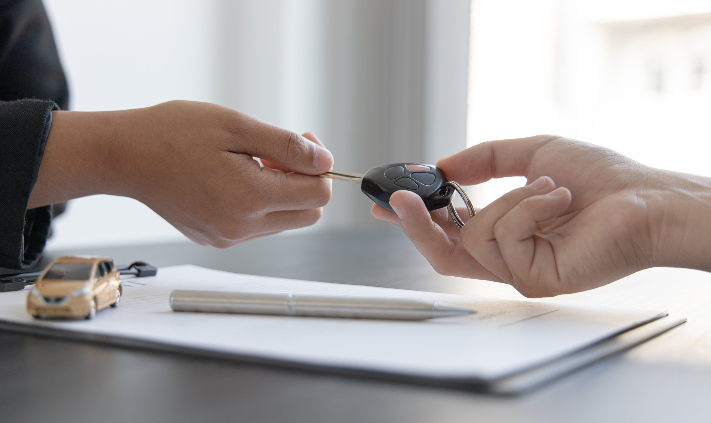 PersonHanding Key for Car 